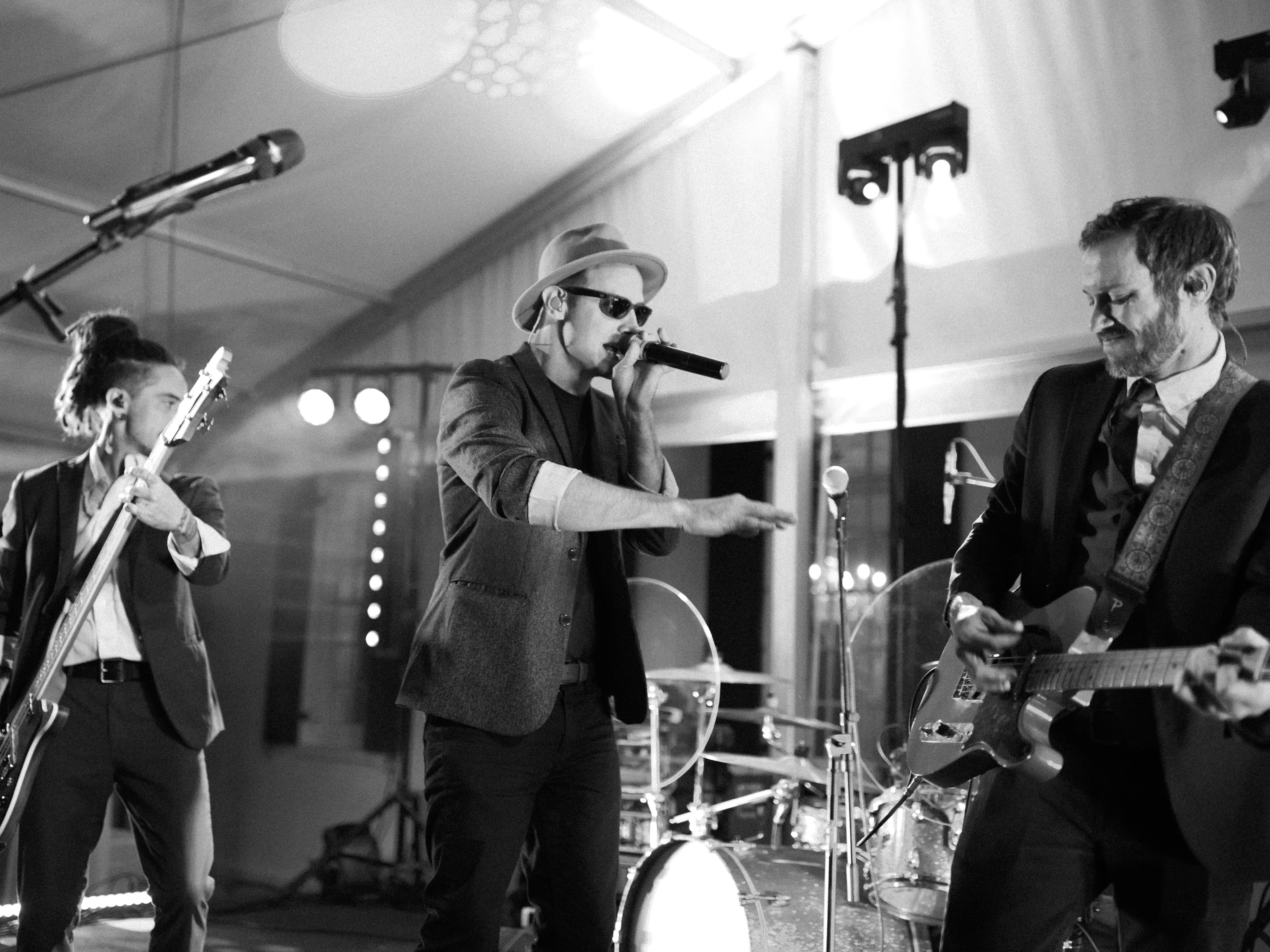Black and white photo of the band performing