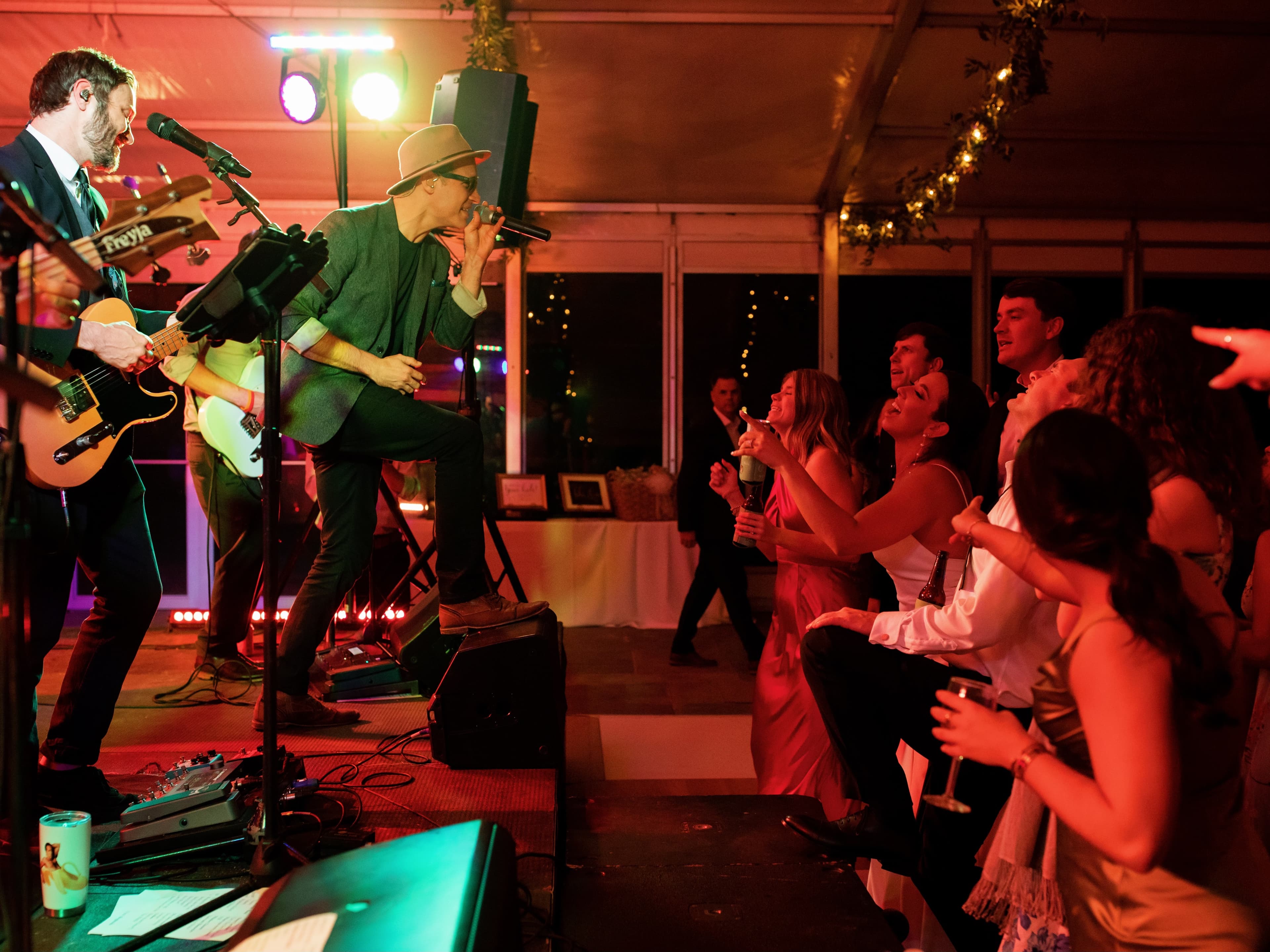 Lead vocalist Zach from DTSMB performing crowd favorite song at Charleston wedding